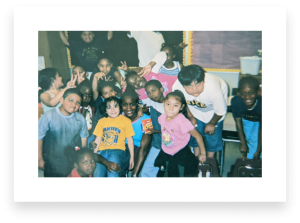 Photo of Alison and students